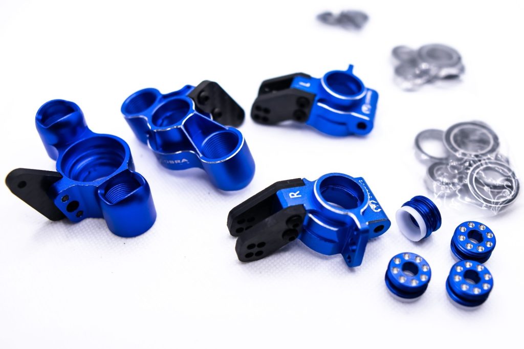Arrma 6S Aluminum Knuckles & Hubs – 7075-T6 + Carbon Fiber Set (Blue)